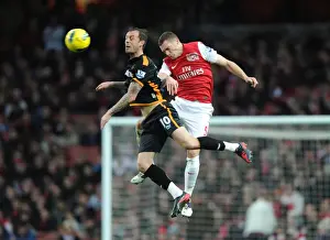 Arsenal's Thomas Vermaelen Heads Ball Away from Steven Fletcher (2011-2012)
