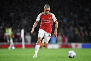 Arsenal V PSV Eindhoven 2023-24 Prints: Arsenal's Thrilling Champions League Clash: Trossard's Epic Dash at Emirates Stadium