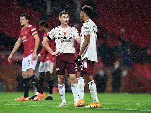 Arsenal's Tierney and Aubameyang Face Off Against Manchester United in Empty Old Trafford (2020-21)
