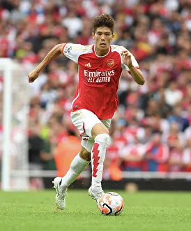 Arsenal's Tokiyasu in Action: Arsenal vs. Nottingham Forest, 2023-24 Premier League at Emirates Stadium