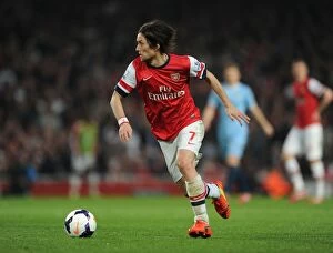Images Dated 29th March 2014: Arsenal's Tomas Rosicky in Action Against Manchester City (2014)
