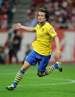 Uwara Red Diamonds v Arsenal 2013-14 Collection: Arsenal's Tomas Rosicky in Action Against Urawa Red Diamonds, 2013