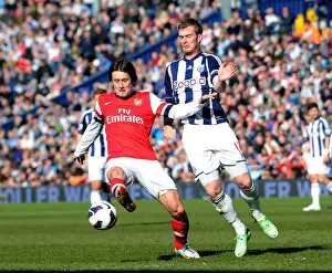 West Bromwich Albion V Arsenal 2012-13 Prints: Arsenal's Tomas Rosicky Fends Off Chris Brunt's Pressure in Premier League Clash
