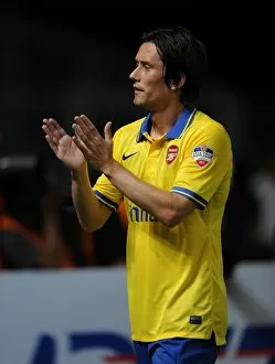 Indonesia Dream Team v Arsenal 2013-14 Collection: Arsenal's Tomas Rosicky Shines in Indonesia Dream Team Clash (2013-14)