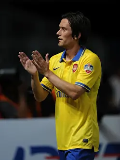 Indonesia Dream Team V Arsenal 2013-14 Prints: Arsenal's Tomas Rosicky Shines in Indonesia Dream Team Clash (2013-14)