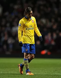 Images Dated 13th January 2014: Arsenal's Tomas Rosicky Suffers Injury During Aston Villa vs Arsenal (2013-14)