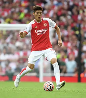 Arsenal's Tomiyasu in Action: 2023-24 Premier League - Arsenal vs. Nottingham Forest