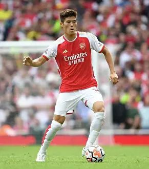 Arsenal's Tomiyasu in Action: Arsenal FC vs Nottingham Forest, Premier League 2023-24