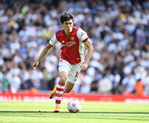 Images Dated 8th May 2022: Arsenal's Tomiyasu in Action: Arsenal vs. Leeds United, Premier League 2021-22