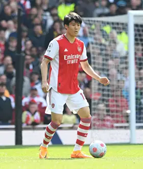 Arsenal's Tomiyasu in Action: Arsenal vs Manchester United, Premier League 2021-22, Emirates Stadium