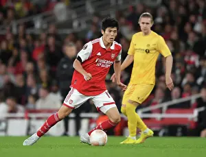 Arsenal's Tomiyasu in Action against FK Bodo/Glimt in Europa League Group A