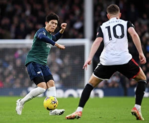 Fulham v Arsenal 2023-24 Collection: Arsenal's Tomiyasu in Action: Fulham vs. Arsenal, 2023-24 Premier League