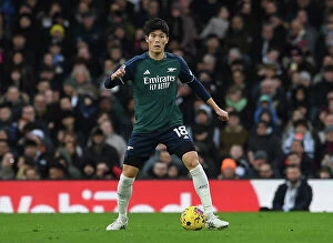 Fulham v Arsenal 2023-24 Collection: Arsenal's Tomiyasu in Action: Fulham vs. Arsenal, 2023-24 Premier League