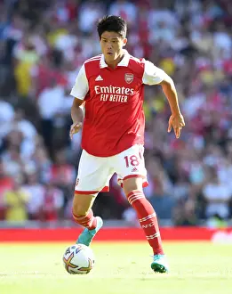 Arsenal V Leicester City 2022-23 Prints: Arsenal's Tomiyasu in Action against Leicester City - Premier League 2022-23
