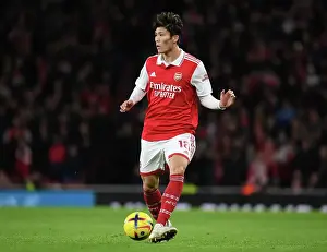 Arsenal V Newcastle United 2022-23 Prints: Arsenal's Tomiyasu in Action against Newcastle in Premier League Clash (2022-23)