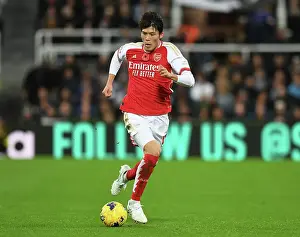 Arsenal's Tomiyasu in Action against Newcastle United - Premier League 2023-24