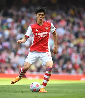 Arsenal's Tomiyasu in Action: Premier League 2021-22 - Arsenal vs Leeds United