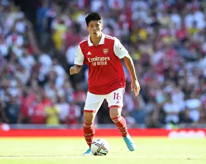Arsenal V Leicester City 2022-23 Prints: Arsenal's Tomiyasu in Action: Premier League 2022-23 - Arsenal vs. Leicester City