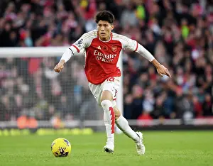 Arsenal's Tomiyasu Charges Forward in Premier League Battle Against Burnley (2023-24)