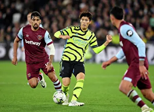 West Ham United V Arsenal - Carabao Cup 2023-24 Prints: Arsenal's Tomiyasu in Control: West Ham vs Arsenal, Carabao Cup 2023-24