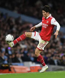 Manchester City V Arsenal 2022-23 Prints: Arsenal's Tomiyasu Faces Manchester City in Emirates FA Cup Clash