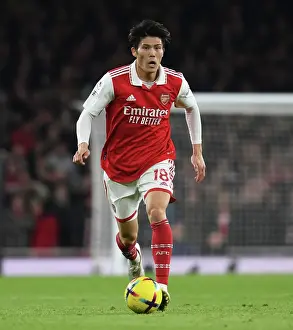 Arsenal V Manchester City 2022-23 Prints: Arsenal's Tomiyasu Faces Manchester City in Intense Premier League Clash