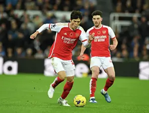 Newcastle United V Arsenal 2023-24 Prints: Arsenal's Tomiyasu Faces Newcastle Challenge in Premier League Clash (2023-24)