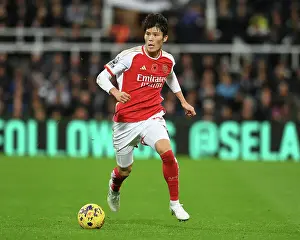 Newcastle United V Arsenal 2023-24 Prints: Arsenal's Tomiyasu Faces Newcastle in Premier League Clash (2023-24)