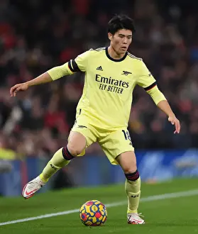Manchester United V Arsenal 2020-21 Prints: Arsenal's Tomiyasu Faces Off Against Manchester United at Old Trafford (Premier League 2020-21)