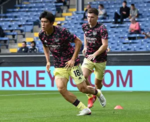 Arsenal's Tomiyasu Gears Up for Burnley Clash in Premier League (2021-22)