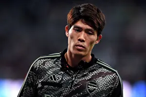 Newcastle United V Arsenal 2023-24 Prints: Arsenal's Tomiyasu Gears Up: Newcastle United vs Arsenal, Premier League 2023-24