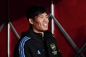 Images Dated 29th December 2023: Arsenal's Tomiyasu Holds Breath: Tense Moment Before Arsenal vs West Ham United