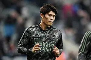 Newcastle United V Arsenal 2023-24 Prints: Arsenal's Tomiyasu Readies for Battle: Newcastle United vs Arsenal