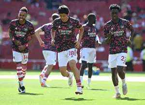 Arsenal's Tomiyasu Warming Up Ahead of Arsenal v Norwich City (2021-22)