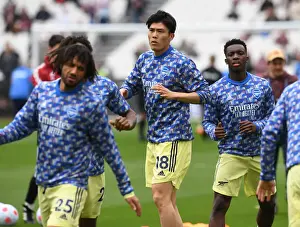 West Ham United V Arsenal 2021-22 Prints: Arsenal's Tomiyasu Warming Up Ahead of West Ham Clash - Premier League 2021-22