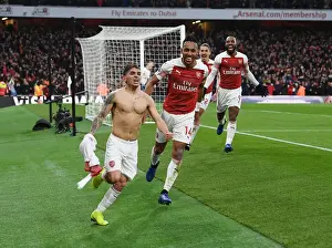 Arsenal's Torreira and Aubameyang Celebrate Goals Against Tottenham in Premier League Showdown