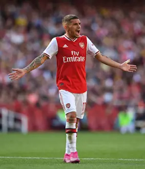 Arsenal's Torreira Faces Off Against Tottenham in Premier League Clash