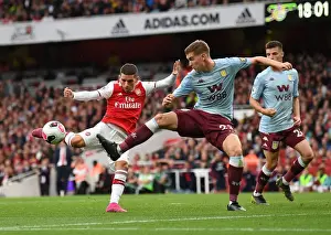 Arsenal V Aston Villa 2019-20 Prints: Arsenal's Torreira Faces Off Against Villa's Engels in Intense Premier League Clash