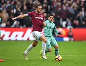 Arsenal's Torreira Faces Off Against West Ham's Carroll in Premier League Clash