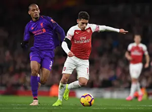 Arsenal V Liverpool 2018-19 Prints: Arsenal's Torreira Takes on Liverpool's Fabinho in Intense Premier League Clash