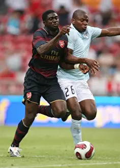 Arsenal V Lazio 2007-8 Prints: Arsenal's Toure Clashes with Mudingayi: Arsenal 2:1 Lazio, Amsterdam Tournament Day 1