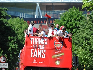 Arsenal Trophy Parade 2014 Prints: Arsenal's Triumph: The 2014 Trophy Parade in Islington