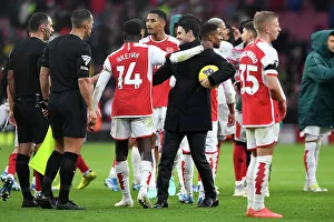 Arsenal's Triumph: Mikel Arteta and Eddie Nketiah Embrace Post-Match at Emirates Stadium (Arsenal v Sheffield United, 2023-24)