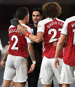 Arsenal's Triumph: Arteta Celebrates with Bellerin and Luiz (2020-21)