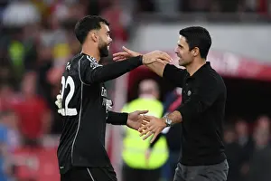 Arsenal's Triumph: Arteta and Raya Celebrate Over Manchester City (2023-24)
