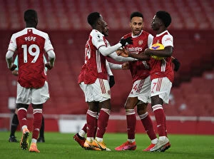 Arsenal v Southampton 2020-21 Collection: Arsenal's Triumph: Aubameyang, Nketiah, Saka's Unforgettable Goal Celebration (2020-21)