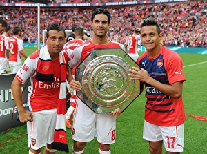 Arsenal V Manchester City - FA Community Shield 2014/15 Prints: Arsenal's Triumph: Cazorla, Arteta, Sanchez Celebrate FA Community Shield Win