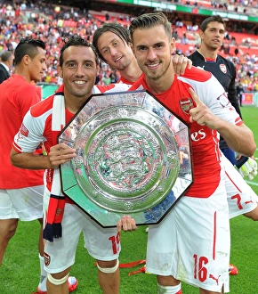 Arsenal V Manchester City - FA Community Shield 2014/15 Prints: Arsenal's Triumph: Cazorla, Rosicky, Ramsey Celebrate FA Community Shield Victory