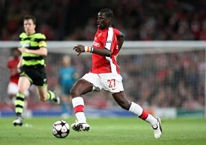 Images Dated 26th August 2009: Arsenal's Triumph: Emmanuel Eboue Leads the Gunners to a 3:1 Victory over Celtic in the UEFA