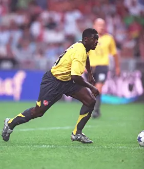 Arsenal's Triumph: Kolo Toure Leads the Way in Arsenal's 1-0 Victory over Ajax at the Amsterdam Tournament, 2005